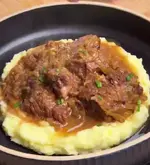 Говядина в луковом соусе..webp